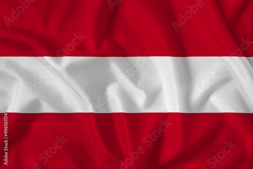 Austria flag with fabric texture. Close up shot, background
