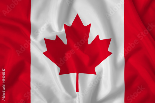 Canada flag with fabric texture. Close up shot, background