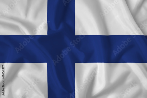 Finland flag with fabric texture. Close up shot, background