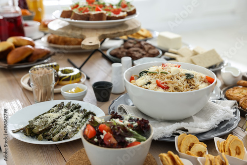 Brunch table setting with different delicious food indoors