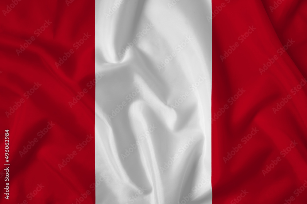 Peru flag with fabric texture. Close up shot, background