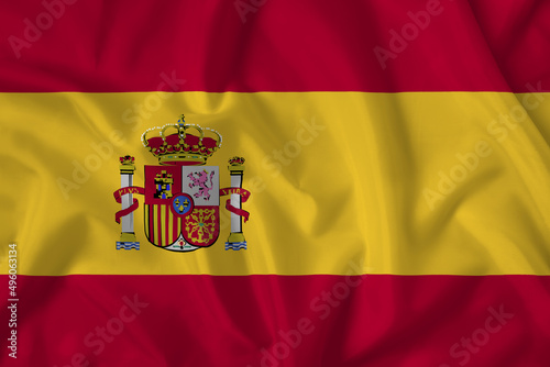 Spain flag with fabric texture. Close up shot, background