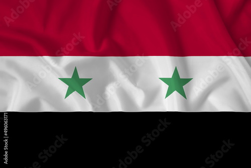 Syria flag with fabric texture. Close up shot, background