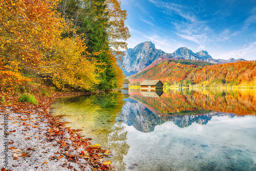 Picturesque autumn scene of sunny morning on Almsee lake. Poppular travell destination. photo