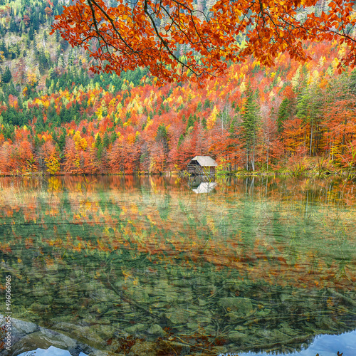 Spectacular autumn scene of Hinterer Langbathsee lake. photo