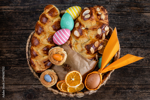 Easter buns and Easter eggs on the table photo