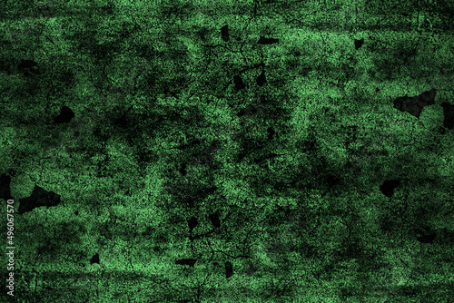 Green grunge texture with random spots on abandoned concrete wall