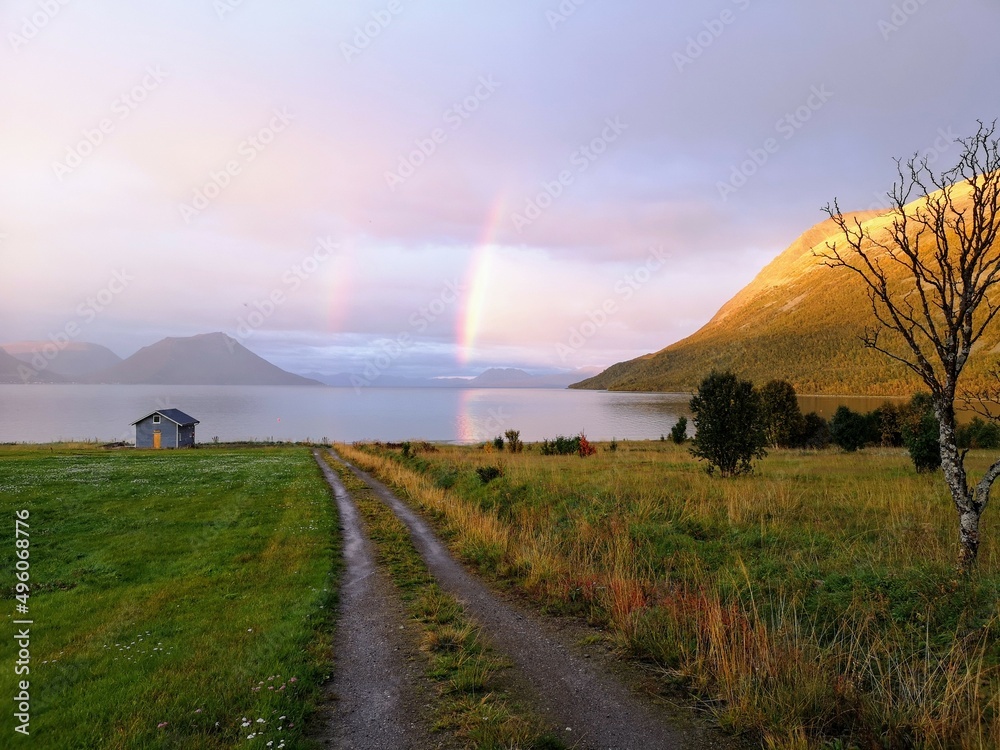 Arctic fjord double rainbow
