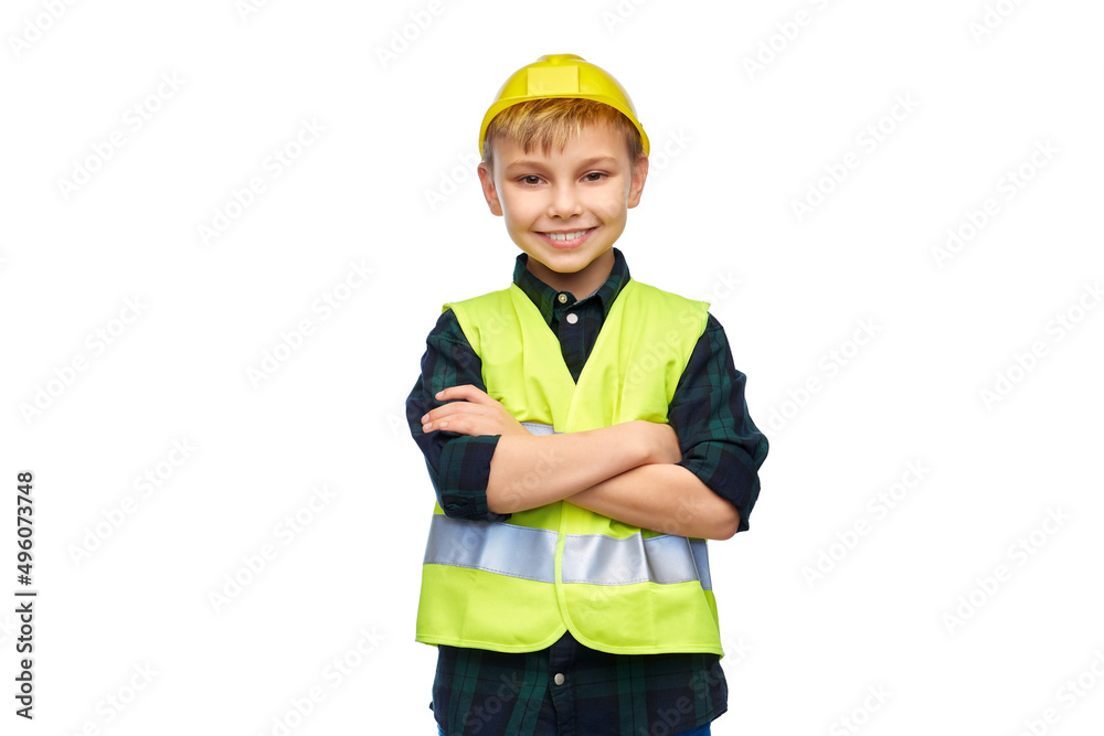 building, construction and profession concept - happy smiling little boy in protective helmet and safety vest with crossed arms over white background building, construction and profession concept - happy smiling little boy in protective helmet and safety vest with crossed arms over white background