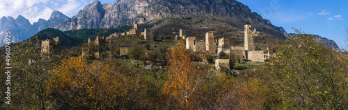 Panorama of an ancient city high in the mountains with battle towers to protect against attacks. Medieval towers for monitoring enemies. The tower complex.