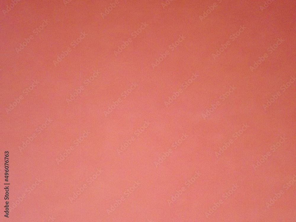 Burgundy, crimson, red, pink paper surface with a clear separation of colors as a background