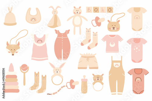 Fototapeta Naklejka Na Ścianę i Meble -  A set of essentials for newborns. A set of children's clothes and toys. Children's boho style. Vector illustration.