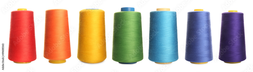 Set with spools of multicolor on white background. Banner design Set with spools of multicolor on white background. Banner design