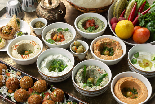 mixed middle eastern meze sharing food platter in turkish restaurant photo
