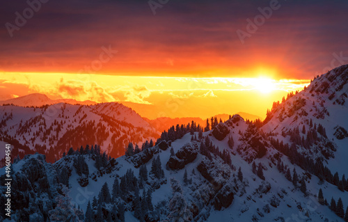 Beautiful sunset over snowy mountains in winter. Allgau Alps  Bavaria  Germany  Europe