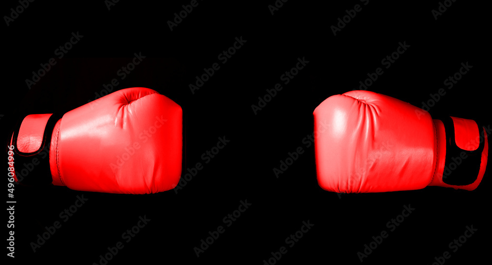Blue Boxing glove in punching  in black background with copy space