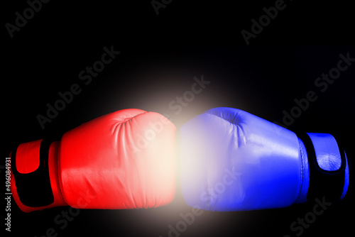 pink Boxing glove in punching  in black background in woman concept © vachcameraman