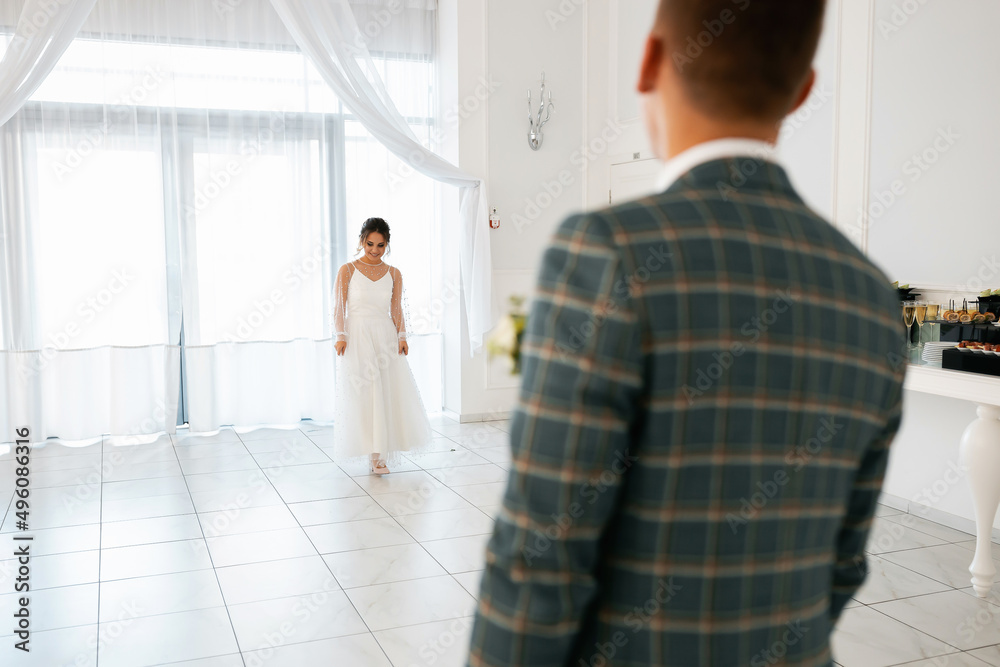 Stylish happy newlyweds, elegant satisfied bride. Newlyweds gathering Stylish happy newlyweds, elegant satisfied bride. Newlyweds gathering