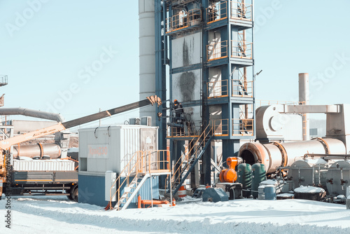 Asphalt concrete plant in winter in Siberia