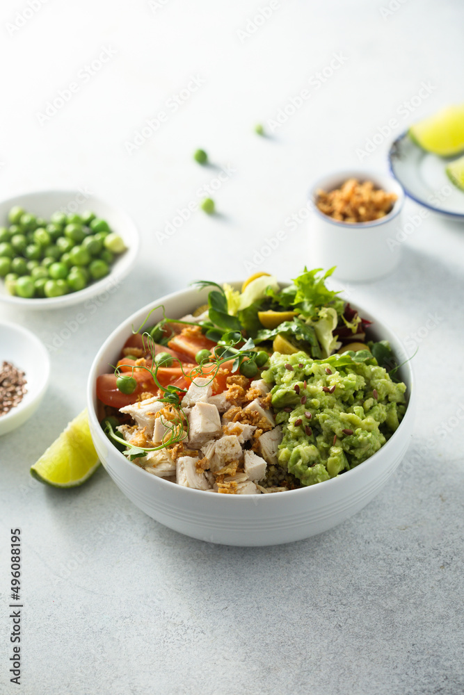 Healthy bowl with chicken and avocado