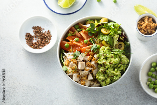 Healthy bowl with chicken and avocado