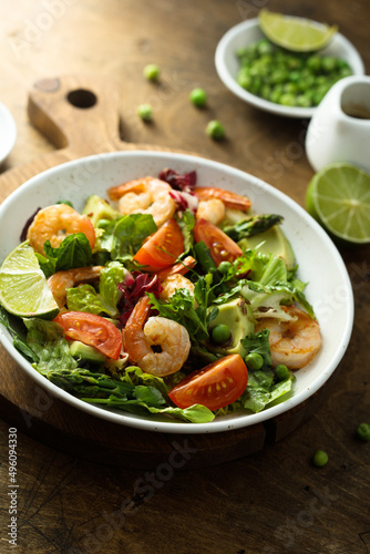 Healthy green salad with shrimps and avocado © marysckin