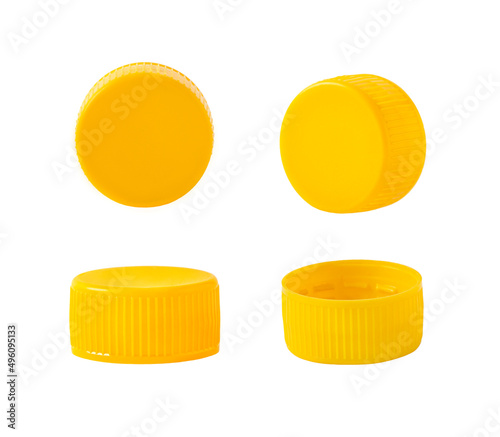 yellow plastic caps insulated on a white background