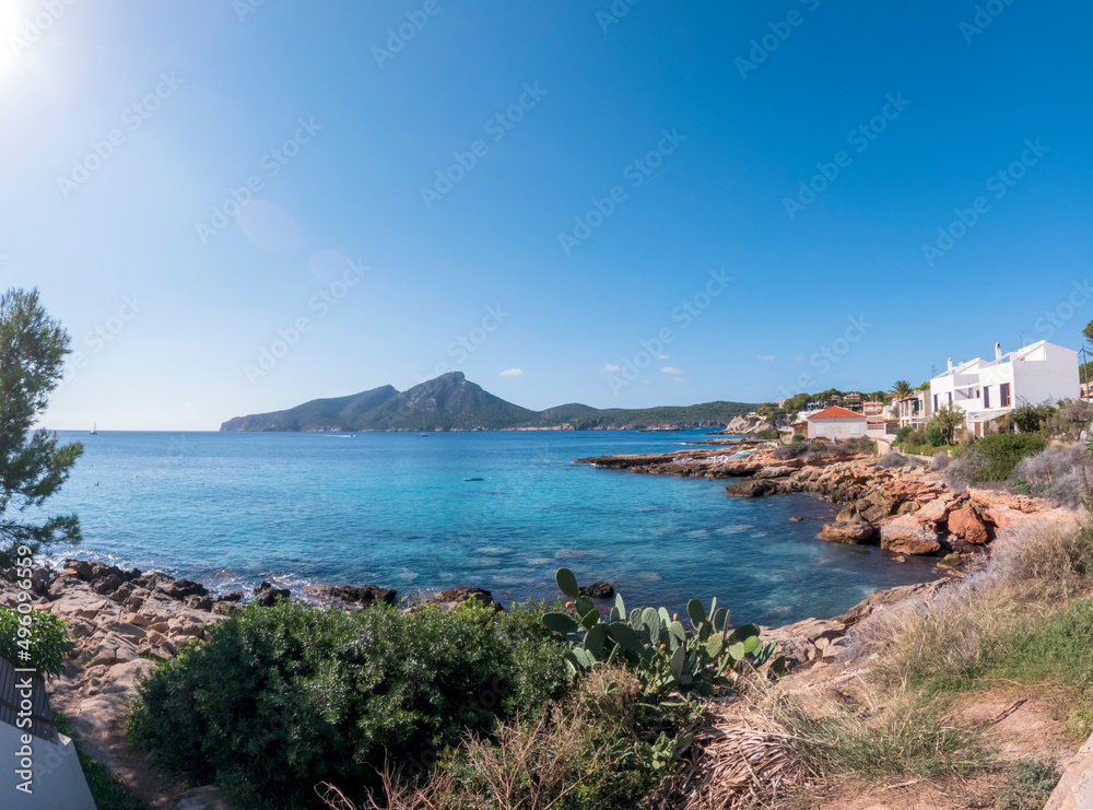 View on the island Sa dragonera covered with green forest surrounded by Mediterranean sea water, Mallorca, Balearic Islands, Spain