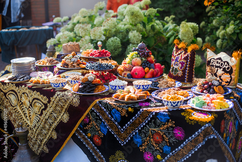 Assortment of desserts, Baklava with pistachio, honey and walnut, Tasty turkish delights photo