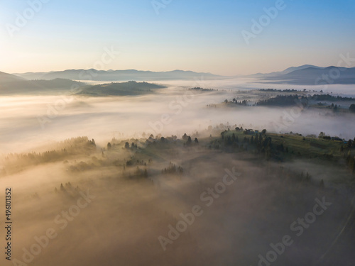 Morning fog in the Ukrainian Carpathians. Aerial drone view.
