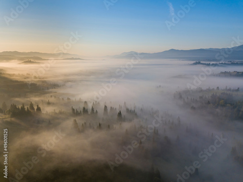 Morning fog in the Ukrainian Carpathians. Aerial drone view.