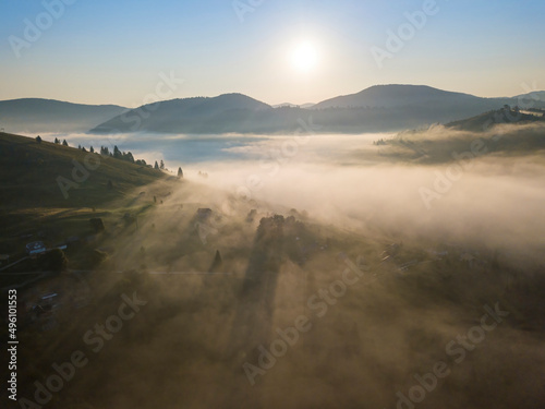 Morning fog in the Ukrainian Carpathians. Aerial drone view.