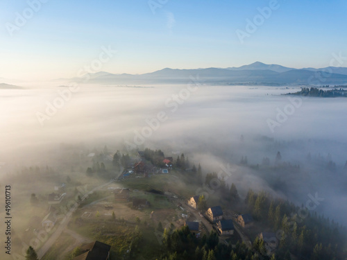 Morning fog in the Ukrainian Carpathians. Aerial drone view.