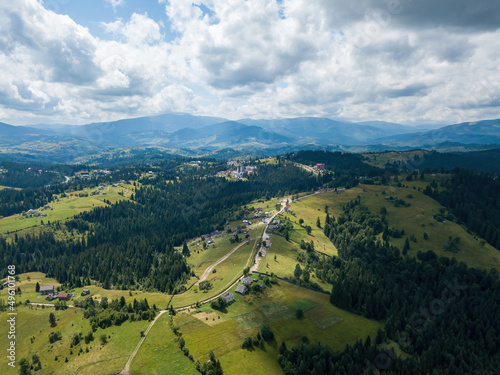 Fototapeta Naklejka Na Ścianę i Meble -  Green Ukrainian Carpathians mountains in summer. Aerial drone view.