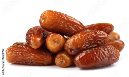 Pile of tasty dry dates isolated on white background.