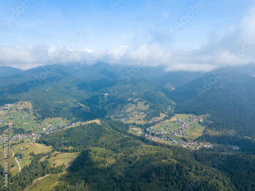 Fototapeta Naklejka Na Ścianę i Meble -  Ukrainian Carpathians mountains on a summer morning. Aerial drone view.