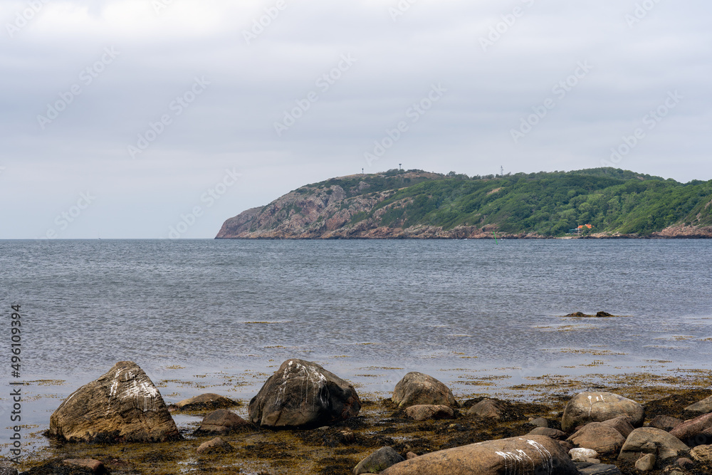 The Kullaberg peninsula seen from fishing village Molle in Sweden. Captured in springtime. Popular hiking destination.