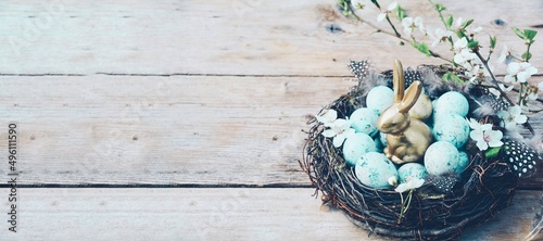 eggs in a nest on a wooden ...