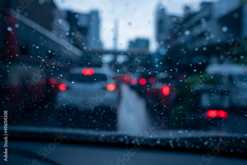 Droplet of water on car mirror  traffic jam