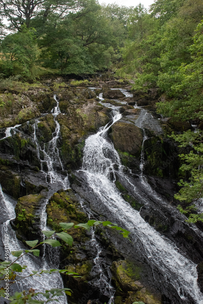 Rhaeadr Ewynnol (Swallow Falls) waterfall, close to the town of Betws-y-Coed. In Snowdonia National Park, north Wales Rhaeadr Ewynnol (Swallow Falls) waterfall, close to the town of Betws-y-Coed. In Snowdonia National Park, north Wales