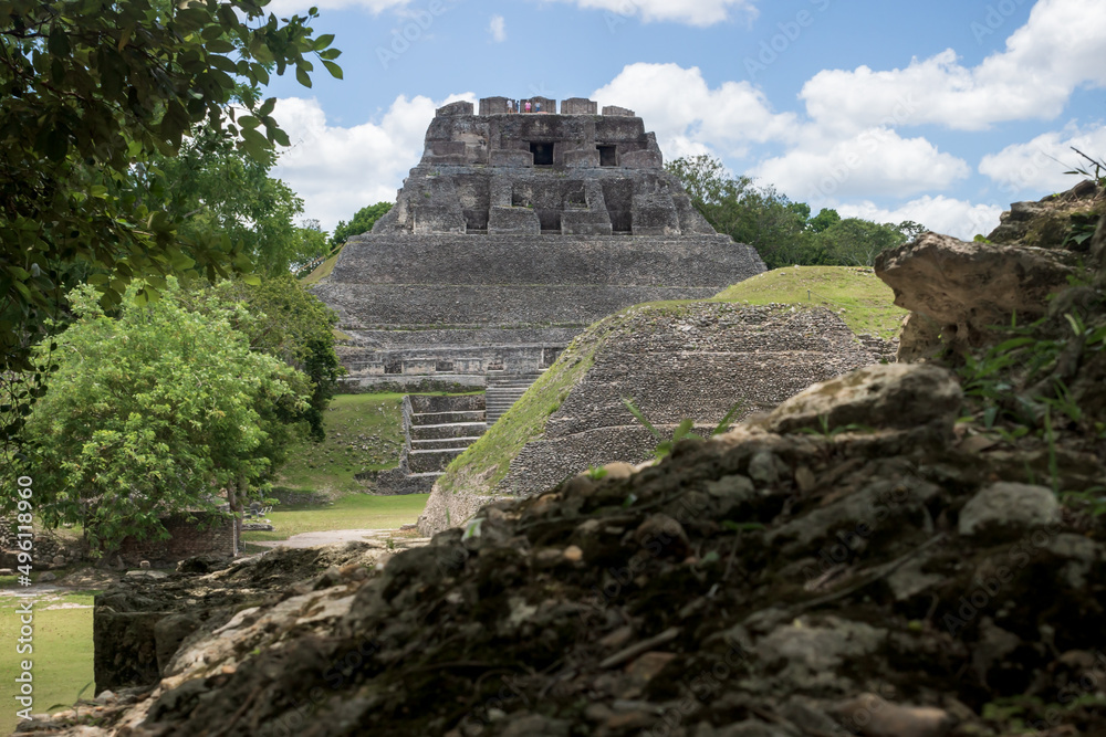 Pyramid 'El Castillo' behind smaller Maya ruins at the archeological site Xunantunich near San Ignacio, Belize