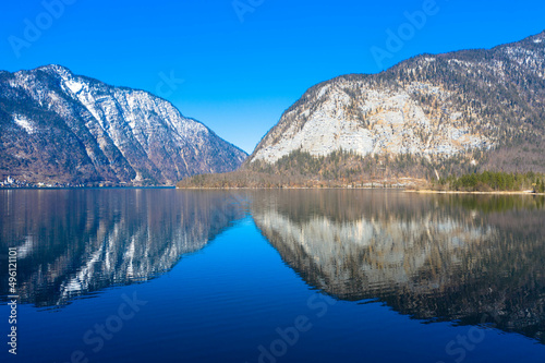 Amazing aerial view of Lake Hallstatt in Austria. The Hallstätter Lake is one of the most famous lakes in the upper austrian Salzkammergut. Dachstein mountains in the background. Hallstatt, Austria