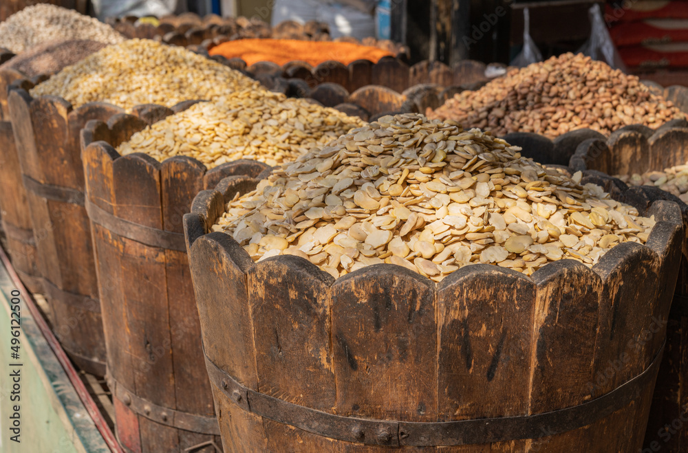 Egyptian Dried food products and almond flakes on the Arab street market stall.