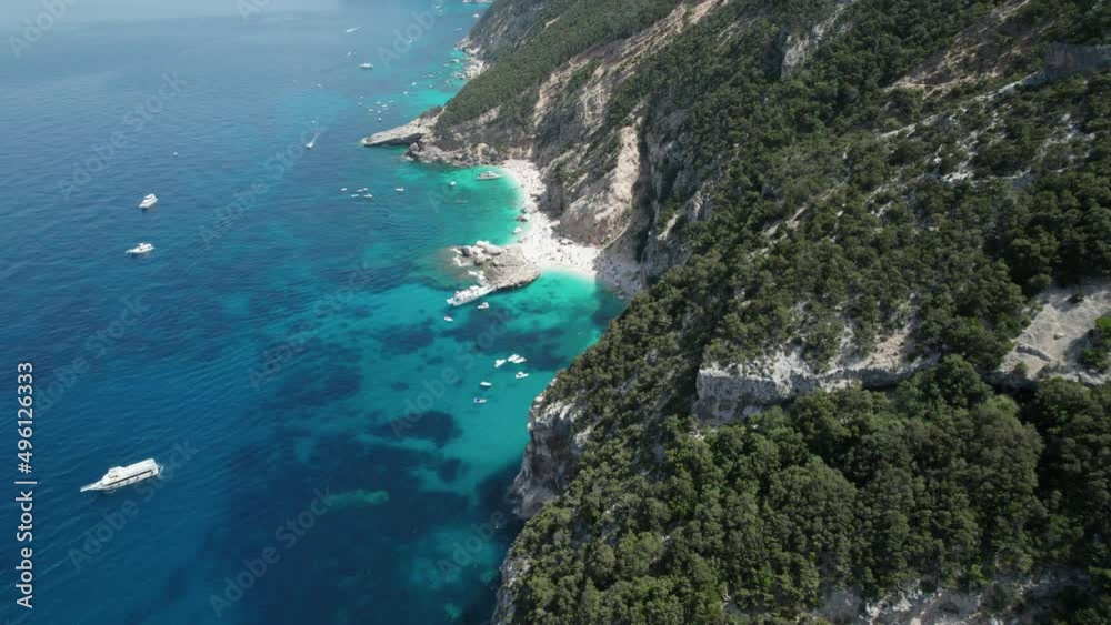 Aerial drone video of blue paradise beaches in the mediterranean, Sardinia, Cala Luna Aerial drone video of blue paradise beaches in the mediterranean, Sardinia, Cala Luna