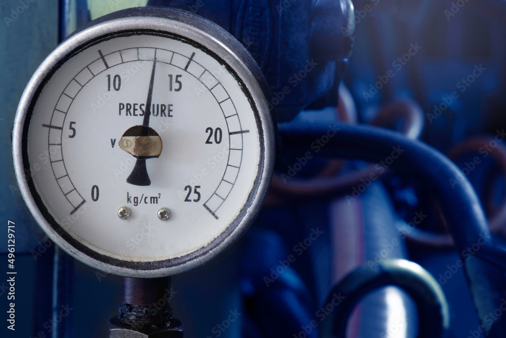 pressure gauge installed on hydraulic pump with motor, solenoid valve
