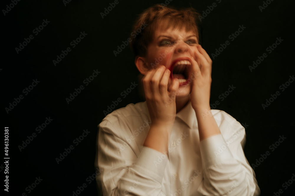 portrait of a psychopathic woman with mental disorders and spiritual diseases on a dark background portrait of a psychopathic woman with mental disorders and spiritual diseases on a dark background