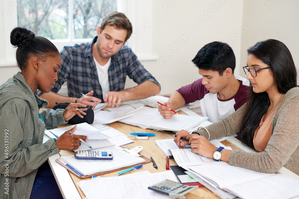 Their finals prep is going well. Cropped shot of a group of university students in a study group. Their finals prep is going well. Cropped shot of a group of university students in a study group.