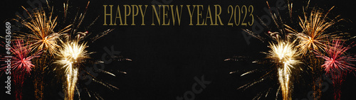 New Year s Eve 2023 New year background banner panorama long- firework fireworks on rustic dark black night sky texture