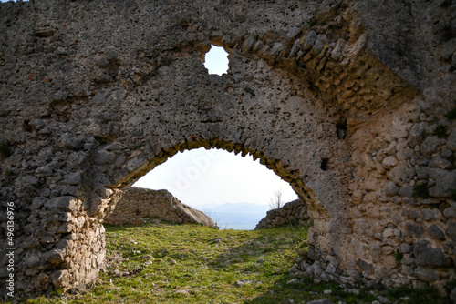 Fototapeta Naklejka Na Ścianę i Meble -  A stone arch in the ruins of the medieval castle of Gioia Sannitica in the province of Caserta, Italy.