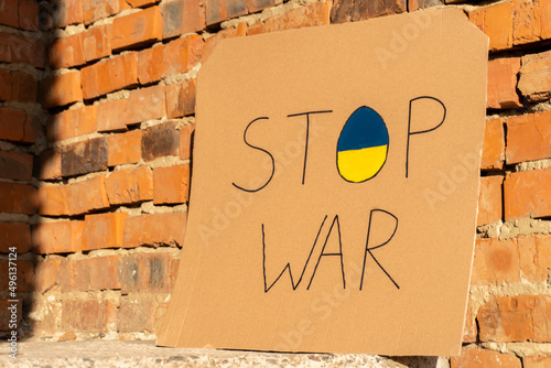 Stop war in Ukraine. Stop the war poster on a background. The war in Ukraine.  Stand with Ukraine. War of Russia against Ukraine.